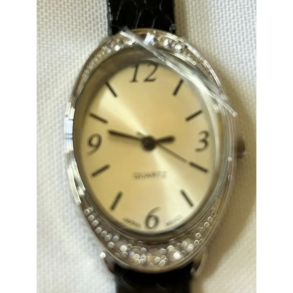 Women's Silver Analog Watch New Battery Arabic Numerals Oval Dial 2010s Casual